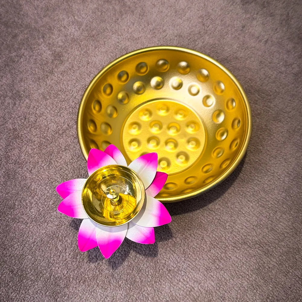 Lotus tealight diya with gold urli plate — wholesale Diwali décor Moradabad